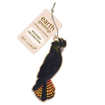 Wooden black cockatoo decoration with 'Earth Greetings' tag on a white background.