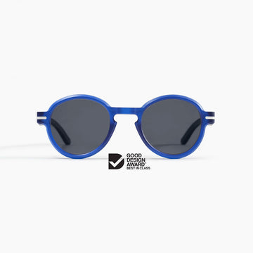 Blue sunglasses with dark lenses on a white background, featuring the Good Design Award logo.