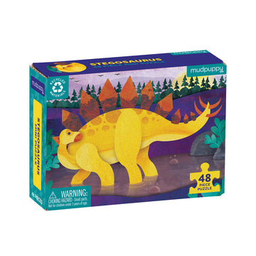 A puzzle box with an illustration of a yellow stegosaurus on the front.