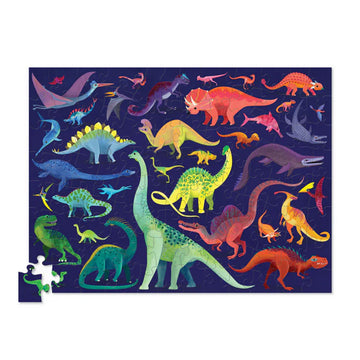 Dinosaur-themed cylinder puzzle packaging with colorful dinosaurs on a blue background.