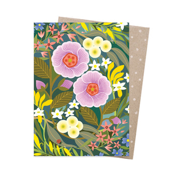A greeting card with a pink and yellow flower design.