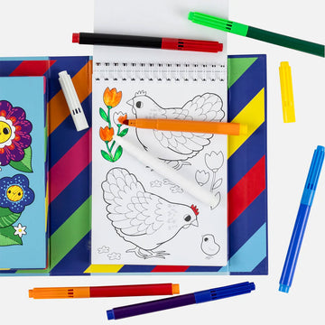 A set titled 'Tiger Tribe Colouring Set' with an illustration of a cat and flowers inside a watering can which has been coloured.