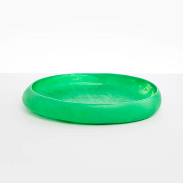 A large shallow bowl made from green resin.