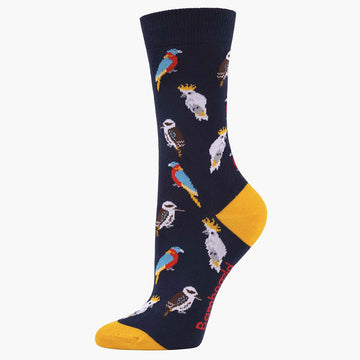 A dark blue sock with a yellow heel and toe and illustrated with Australian birds.