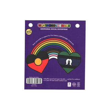 Sticker shaped like a rainbow connecting the Aboriginal and Torres Strait Islander flags in hearts with 'Clothing the Gaps' branding on a purple background.