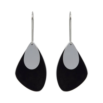 A pair of drop earrings made from stainless steel with a black layer underneath and a smaller silver layer on top.