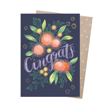 A greeting card with the text 'Congrats' surrounded by flowers.