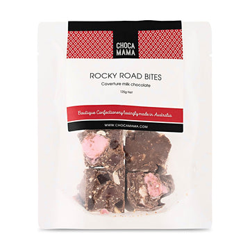 A clear bag with the heading 'Rocky Road Bites' with the chocolate visible inside.