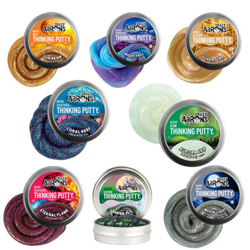 Eight small tubs filled with a different coloured putty. The labels on the tins say 'Crazy Aaron's Thinking Putty'.