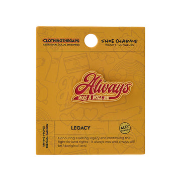 Packaged shoe charm with 'Always Was a Will Be' design on a yellow background.