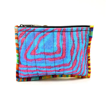 Colorful blue pink patterned pouch on a white background.