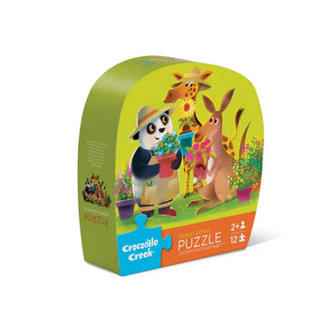 A puzzle box with an illustration of a panda, giraffe and kangaroo holding pots of flowers.