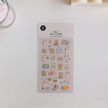 A sticker sheet filled with tiny stickers of cats performing different activities including holding a briefcase, reading a book and listening to music.