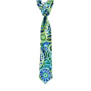 A tie is hanging and printed with artwork by Cedric Varcoe in blue and green.