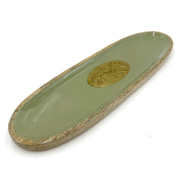 Green wooden tray with gold emblem on a white background.