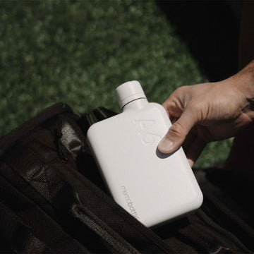 A white flat bottle with the text 'A6' in the top right corner.