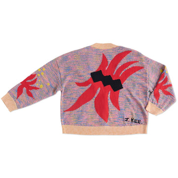 Front view of a knitted cardigan with floral and heart motifs.