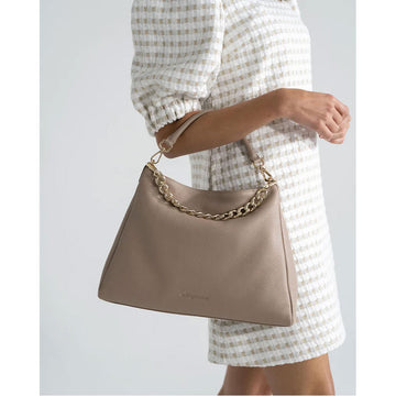 A fawn coloured bag with a matching short strap and zip along the top.