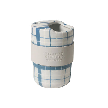 A ceramic travel mug with a blue plaid design.