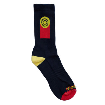 A black sock with a yellow heel, red toe and a red rectangle and yellow circle printed on the sock.