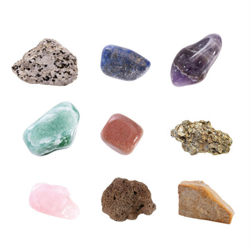 A box titled 'Planet Dig Earth' with a picture of a Earth shaped rock smashed in with gem stones floating around it.