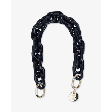 A bag strap in navy with a large acrylic chain detail.