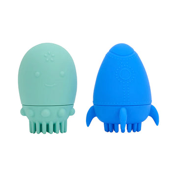 Two bath toys made from silicone. One is green and shaped like a squid and the other is blue shaped like a rocket.