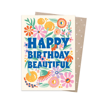 A greeting card with the text 'Happy Birthday Beautiful' surrounded by flowers.