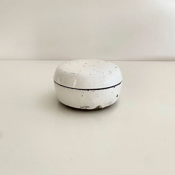 A ceramic handmade jewellery box in white stoneware.