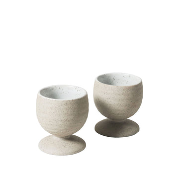 A set of two ceramic egg cups.