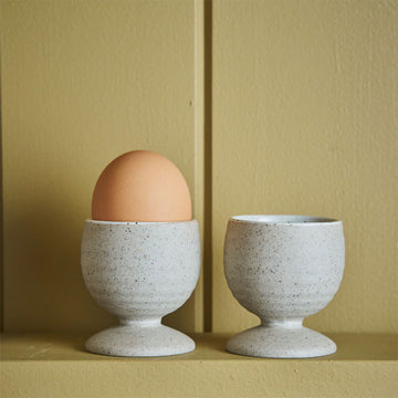 A set of two ceramic egg cups.