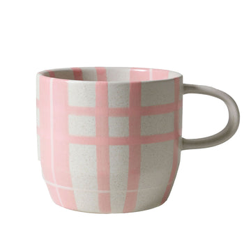 Mug with pink and gray checkered pattern on a white background.