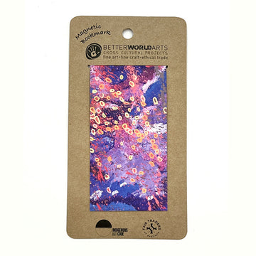 A magnetic bookmark printed with artwork by Stephen Nelson attached to a brown card.