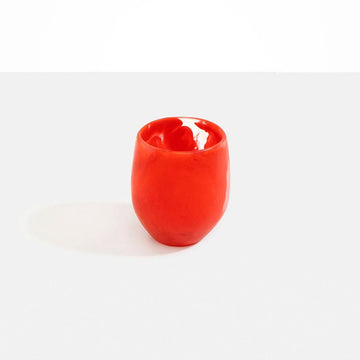 A cup made from red resin.