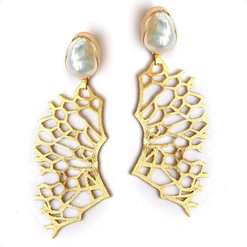 A pair of stud drop earrings with a pearl at the top and gold coral shaped pieces hanging below.