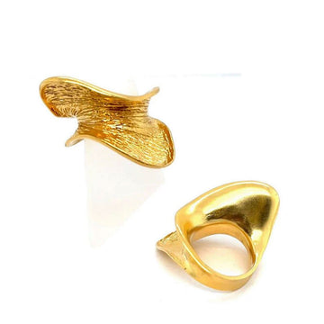 A gold ring with a concave shape shown from the front and back.