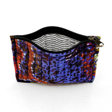 Front view of a fabric pouch printed with purple and red artwork.