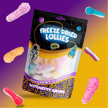 A bag of freeze dried lollies with lollies around the bag.
