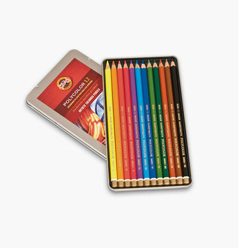 An open pencil tin filled with coloured pencils resting on the tin lid.