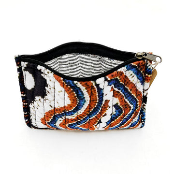 A zippered pouch printed with white, blue and orange artwork.