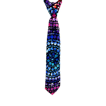 A tie is hanging and printed with artwork by Olivia Wilson in shades of blue and pink.
