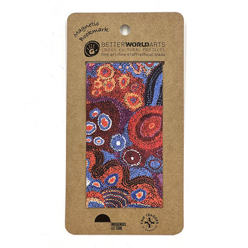A magnetic bookmark printed with artwork by Andrea Adamson attached to a brown card.