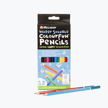 A pack of coloured pencils with a few pencils laying in front of the packet.