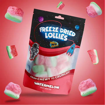 A packet of freeze dried watermelon lollies with lollies around the bag.