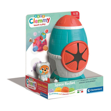 A baby toy shaped like a rocket with sensory elements in an open card box.