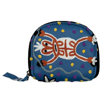 A zippered coin purse in blue with embroidered details.