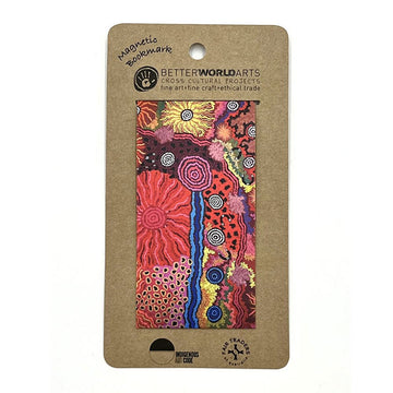 A paper bookmark illustrated with artwork of circles and patterns in a colourful print. The bookmark is attached to a brown card.