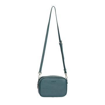 Front view of a box shaped cross body bag in teal.