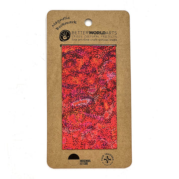 A magnetic bookmark printed with artwork by Andrea Adamson attached to a brown card.