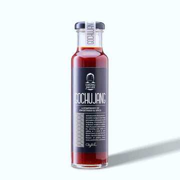Bottle of Chung Jae Lee Gochujang sauce on a white background.